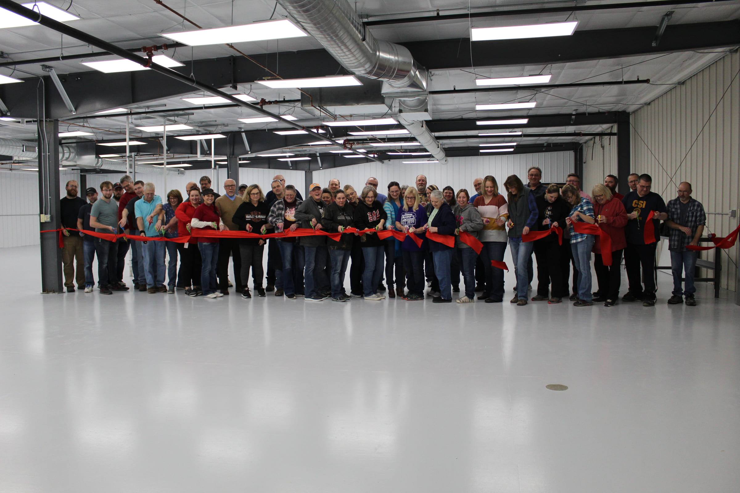 The IRD Glass team inside a Minnesota manufacturing facility